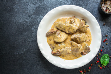 liver cream stew, creamy sauce chicken liver, healthy diet eating keto or paleo diet
menu concept background. top view. copy space for text