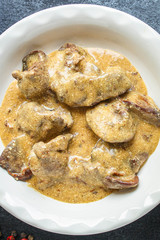 liver cream stew, creamy sauce chicken liver, healthy diet eating keto or paleo diet
menu concept background. top view. copy space for text