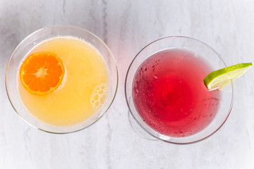 Clementine martini and Cosmopolitan cocktail, overhead view
