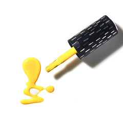 Yellow varnish on a white background, wet drop. Isolate - splashes of nail polish. Interesting and...