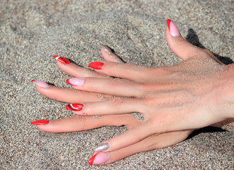 finger nails in the sand