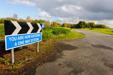 Sign warning motorists that they are now entering a one-way system