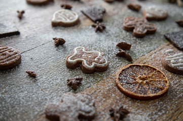 Fototapeta na wymiar Christmas background with cookies and icing sugar