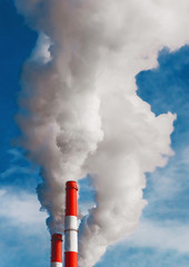 Environmental pollution, environmental problem, smoke from the chimney of an industrial plant or...