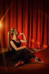 Portrait of a young ballerina on stage