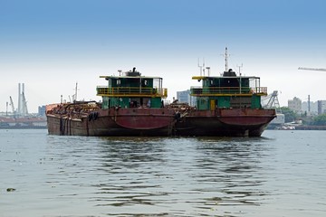 Fototapeta na wymiar ships on nha ben river in ho chi minh city
