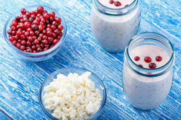 yogurt with cranberries on the table