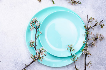 Spring table setting with blooming branch