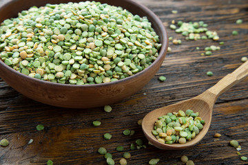 Homemade dried green peas in a clay bowl.