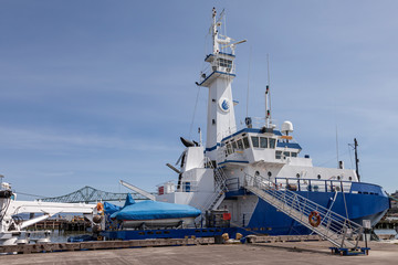 Fototapeta na wymiar Astoria responder docked in a harborOregon.
