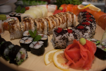 sushi set on a bamboo plate, food close up