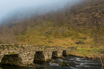 old stone bridge over the river