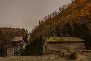 old abandoned houses with waterfall 
