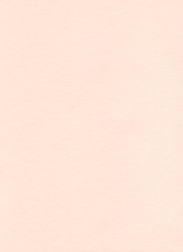 Elegant beige paper background. Sandy and peachy colored pastel paper. Warm modern textured sheet of paper. Abstract homogeneous flatlay, top view. Vertical format. Free space for your text.