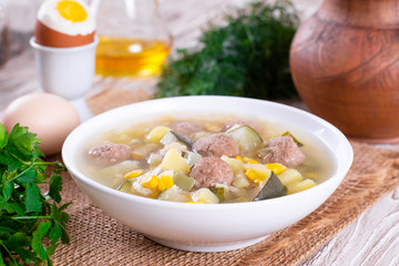 Soup with meatballs and vegetables. Baby food