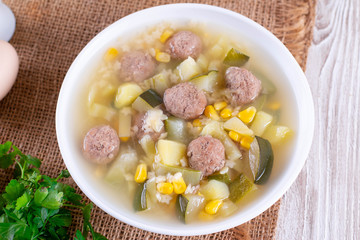 Soup with meatballs and vegetables. Baby food
