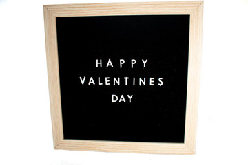 A Sign That Says Happy Valentines Day On a White Background