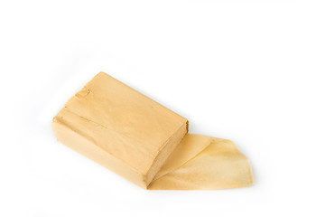 Old yellow toilet paper rolls  on a white