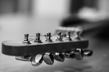 Guitar strings, close. Acoustic guitar. Black and white photography. Selective focus 
