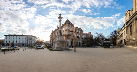 Obraz premium Empty Lviv streets during COVID-19 Quarantine. Jesus Christ crucified near Bernardine church in Lviv, Ukraine