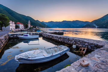  boats in the sea at sunset