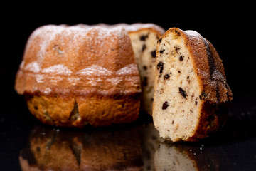 Cake, raisins, black background 11