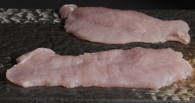 Veal tenderloin is laid out for a dime