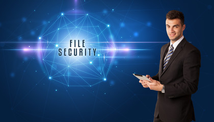 Businessman thinking about security solutions with FILE SECURITY inscription