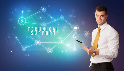 Businessman in front of cloud service icons with TECHNICAL SUPPORT inscription, modern technology concept