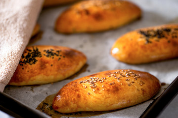home-made sesame and black cumin pastry in the baking tray