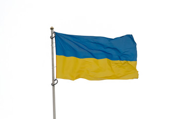 Ukrainian flag on the flag pole isolated on a white background