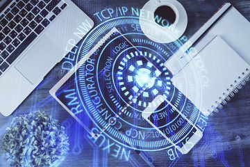 Double exposure of technology theme drawing over work table desktop. Top view. Global data analysis concept.