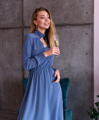 young woman in a blue dress