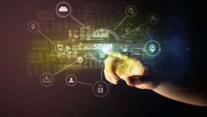 Hand touching SPAM inscription, Cybersecurity concept