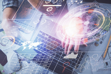 Double exposure of man and woman working together and data theme hologram drawing. Computer background. Top View.