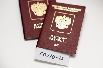 Coronavirus COVID-19 and tourism. Passport, COVID-19 inscription for travel. Quarantine. Restriction for tourists. Covid19 Corona virus disease danger pandemic spread worldwide global