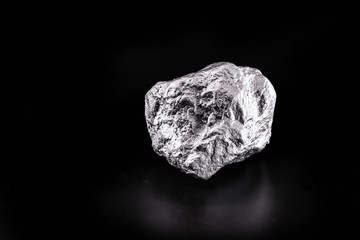 Palladium is a chemical element that at room temperature contracts in the solid state. Metal used in industry. Mineral extraction concept.