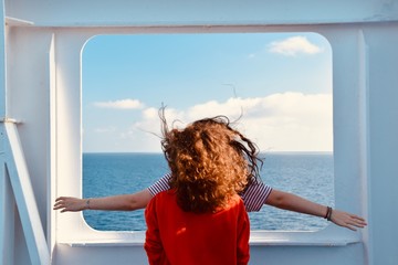 girl looking out the window