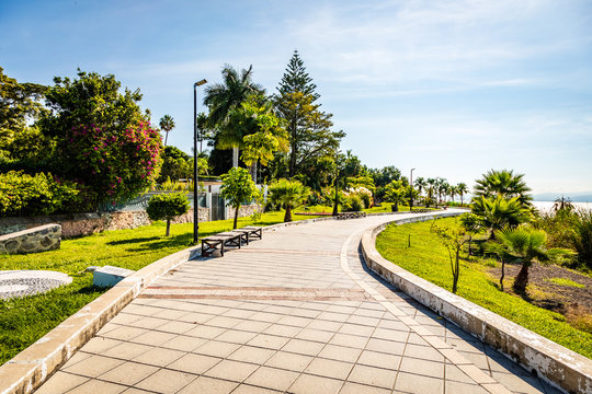 The broad paved malecon in Ajijic Mexico winds back and forth next to lake Chapala