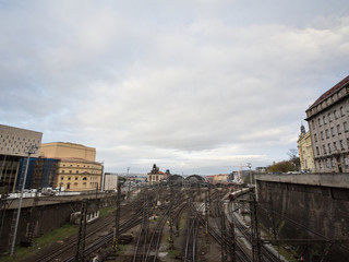 Naklejka premium Panorama of the entrance to Main hall of Prague main train station, Praha Hlavni Nadrazi, with platforms, rails & trains. It is the most important railway hub of the city