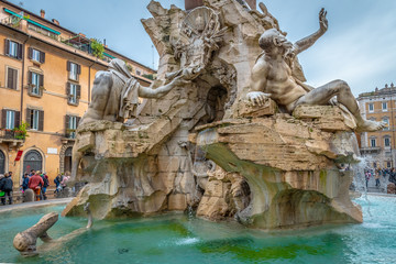Rome, Italy. Fountain of Four Rivers (Fontana dei Quattro Fiumi) in Piazza Navona. 4 river gods sculptures of major rivers of papal authority continents. Nile, Danube, Ganges, Plata