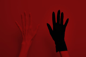 Hands in protective gloves with a syringe and antiseptics