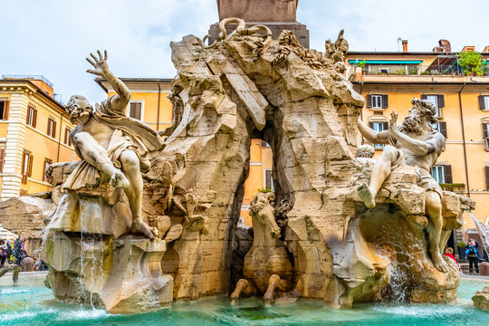 Rome, Italy. Fountain of Four Rivers (Fontana dei Quattro Fiumi) in Piazza Navona. 4 river gods sculptures of major rivers of papal authority continents. Nile, Danube, Ganges, Plata