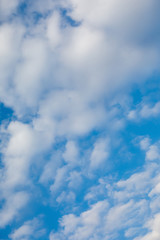 Obraz premium Clouds close the blue sky. concept of weather deterioration, obstacles