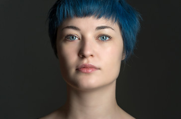 Beautiful girl with blue short hair