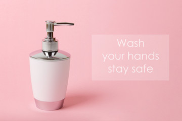 Liquid soap and sanitizer for hands on pink background. Stay home and stay safe. Self care and antivirus security. Hand disinfection. Measures to avoid infection. Quarantine  everyday hygiene banner