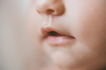 Obraz premium Close up of newborn smiling