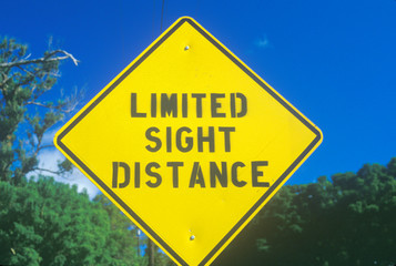A sign that reads ÒLimited Sight DistanceÓ