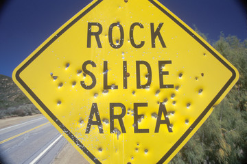 A sign that reads ÒRock Slide AreaÓ