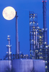 An industrial moonrise over a chemical plant in Delaware